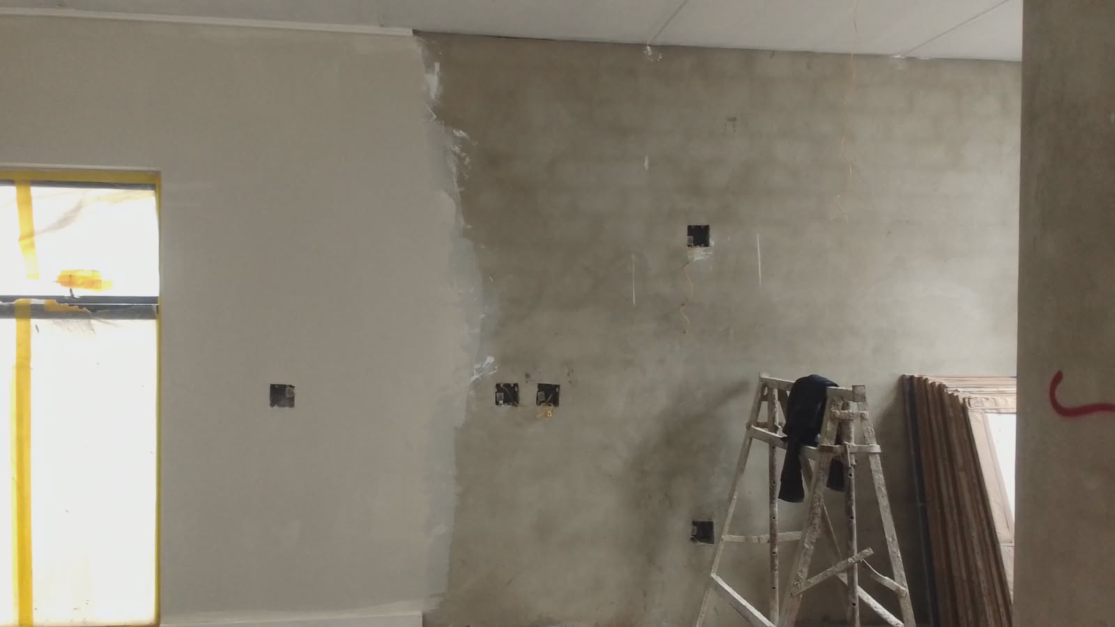 Glass-smooth skimmed ceiling, cornice and doorway finished by ZK Plastering